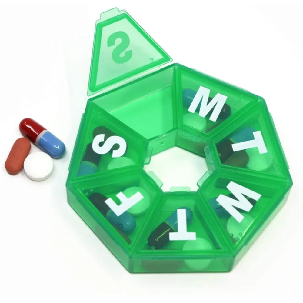 Green pill organizer with compartments labeled for each day of the week, accompanied by some pills on a white background.