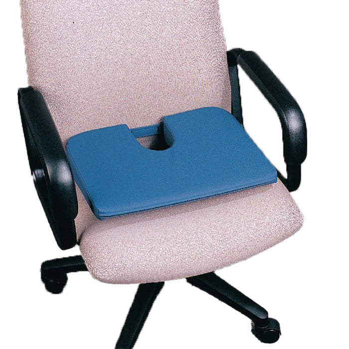 Blue cushion on an office chair with a white background