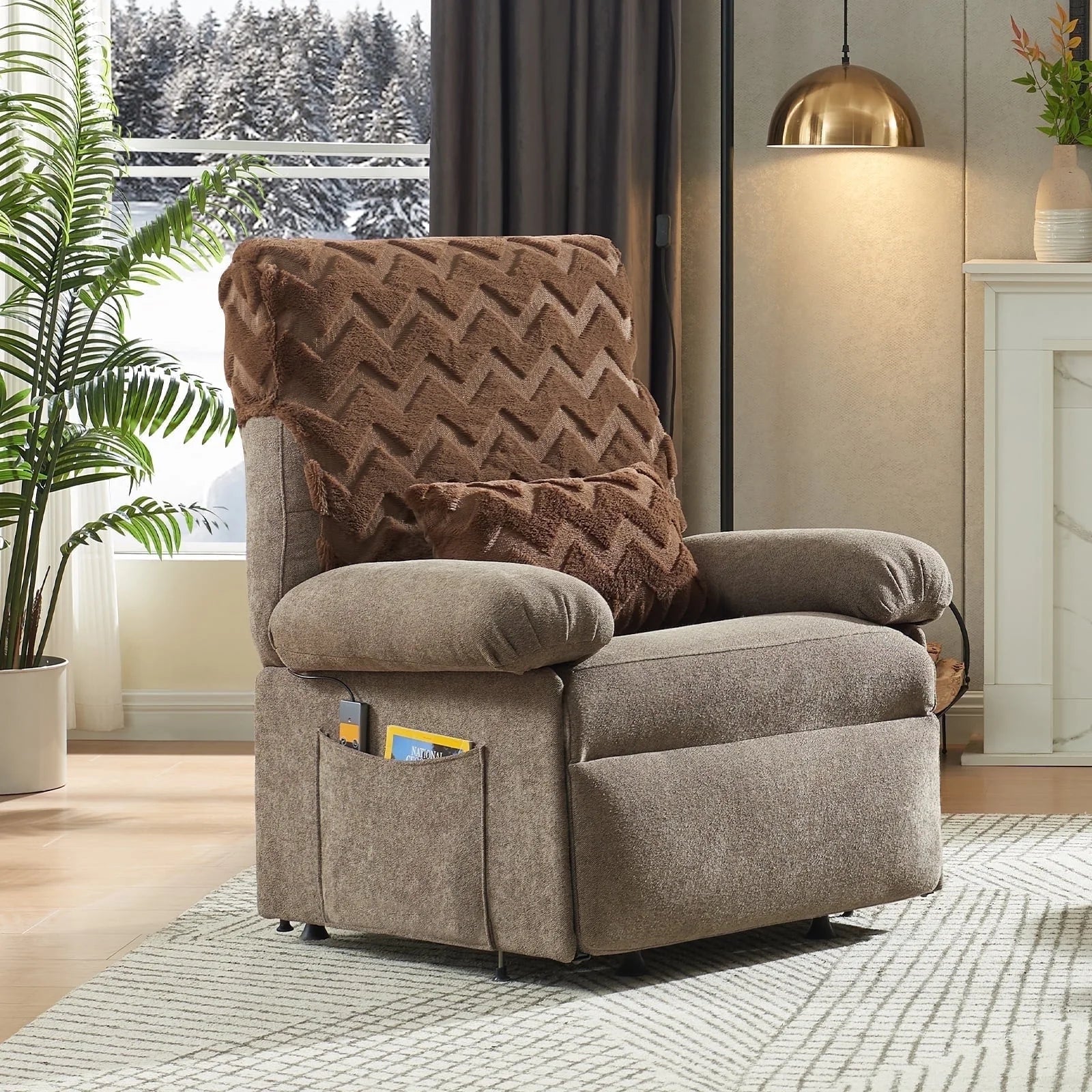 Beige recliner chair with a brown patterned blanket in a living room setting.