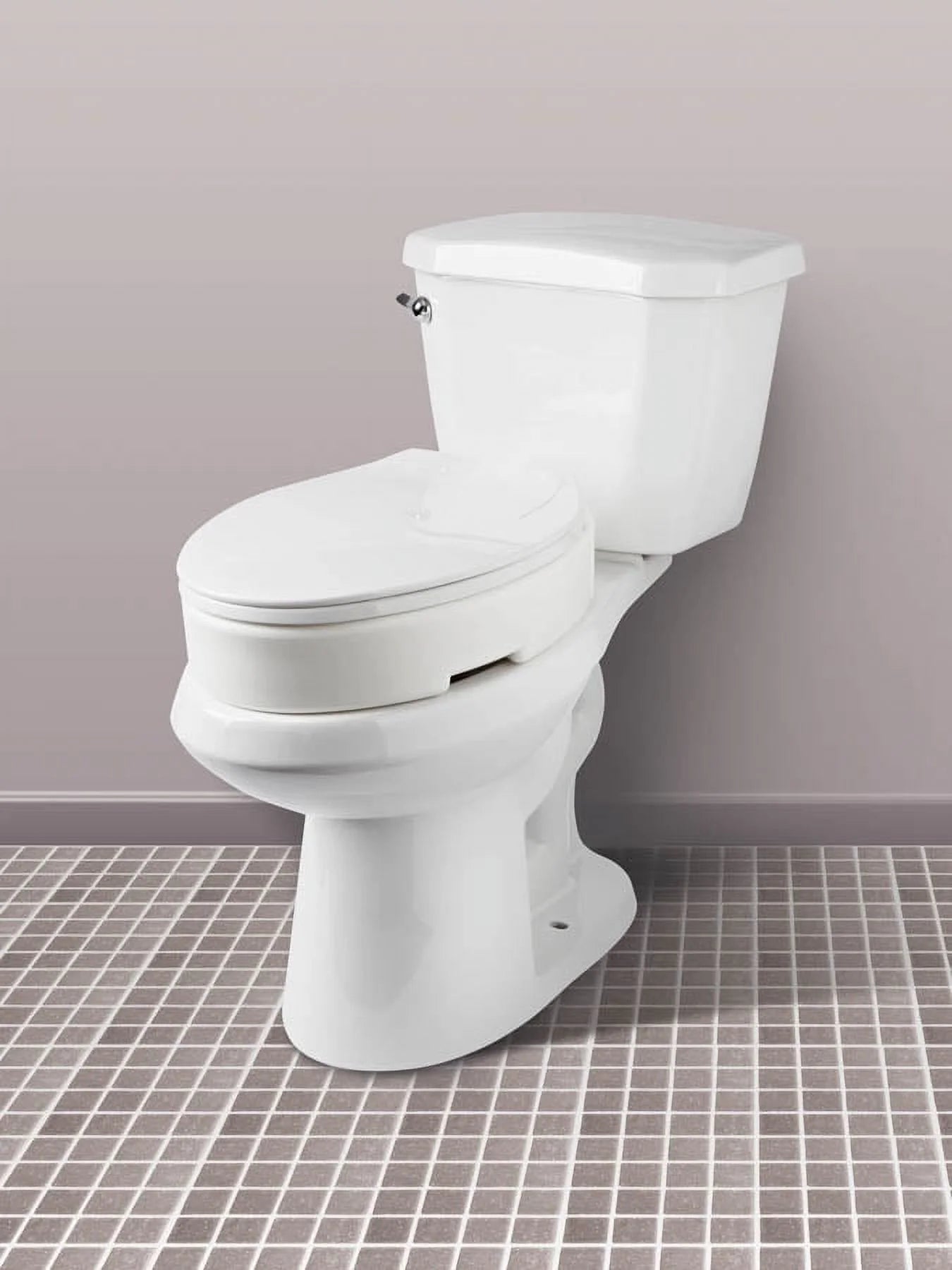 Carex Elongated Toilet Seat installed on standard toilet. Designed for seniors and recovery support.