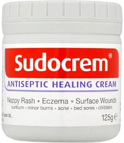 Sudocrem antiseptic healing cream jar with red and white label

