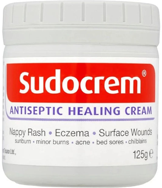 Sudocrem antiseptic healing cream jar with red and white label

