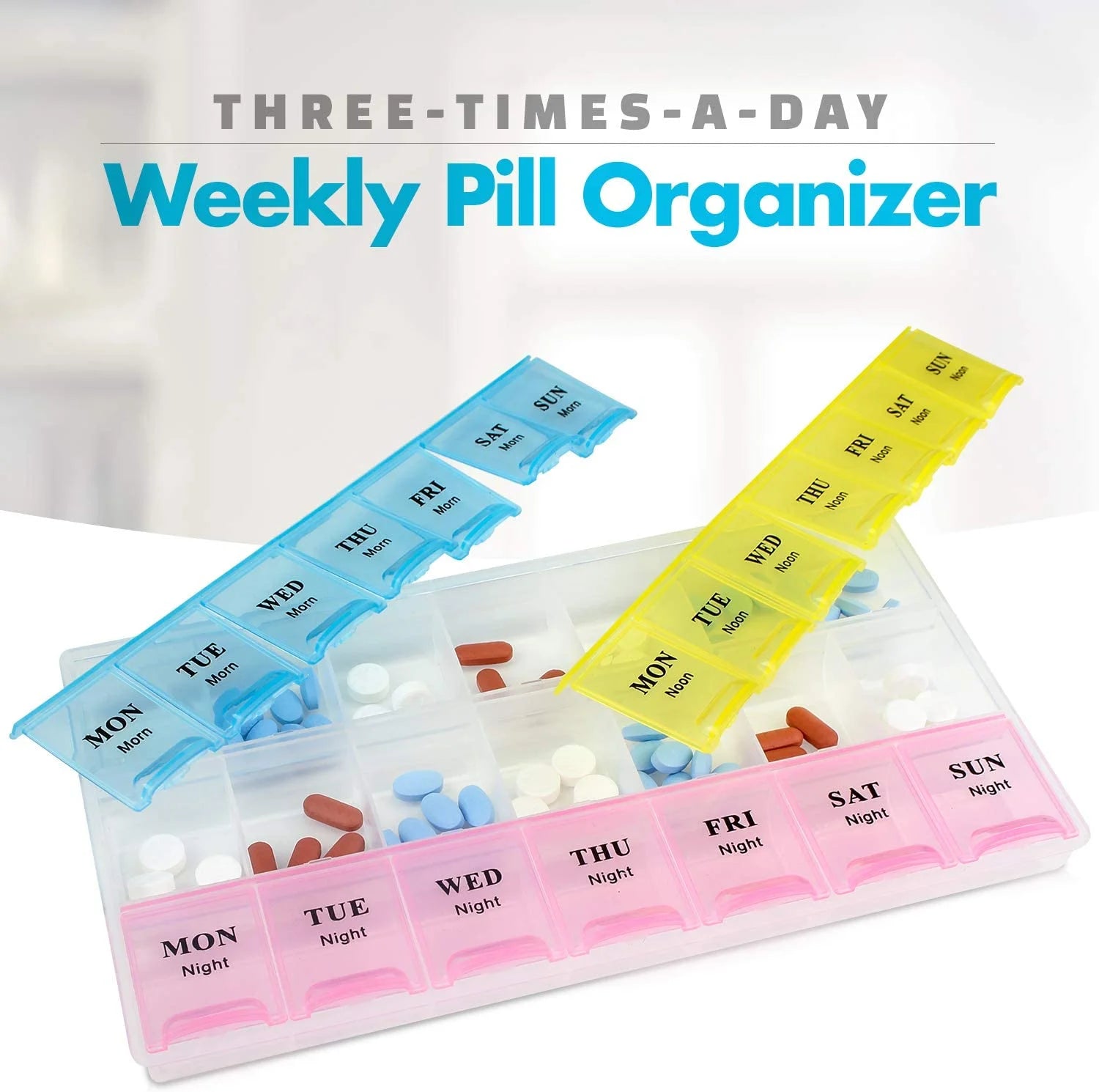 Weekly pill organizer with compartments for different days of the week, showing pills inside.

