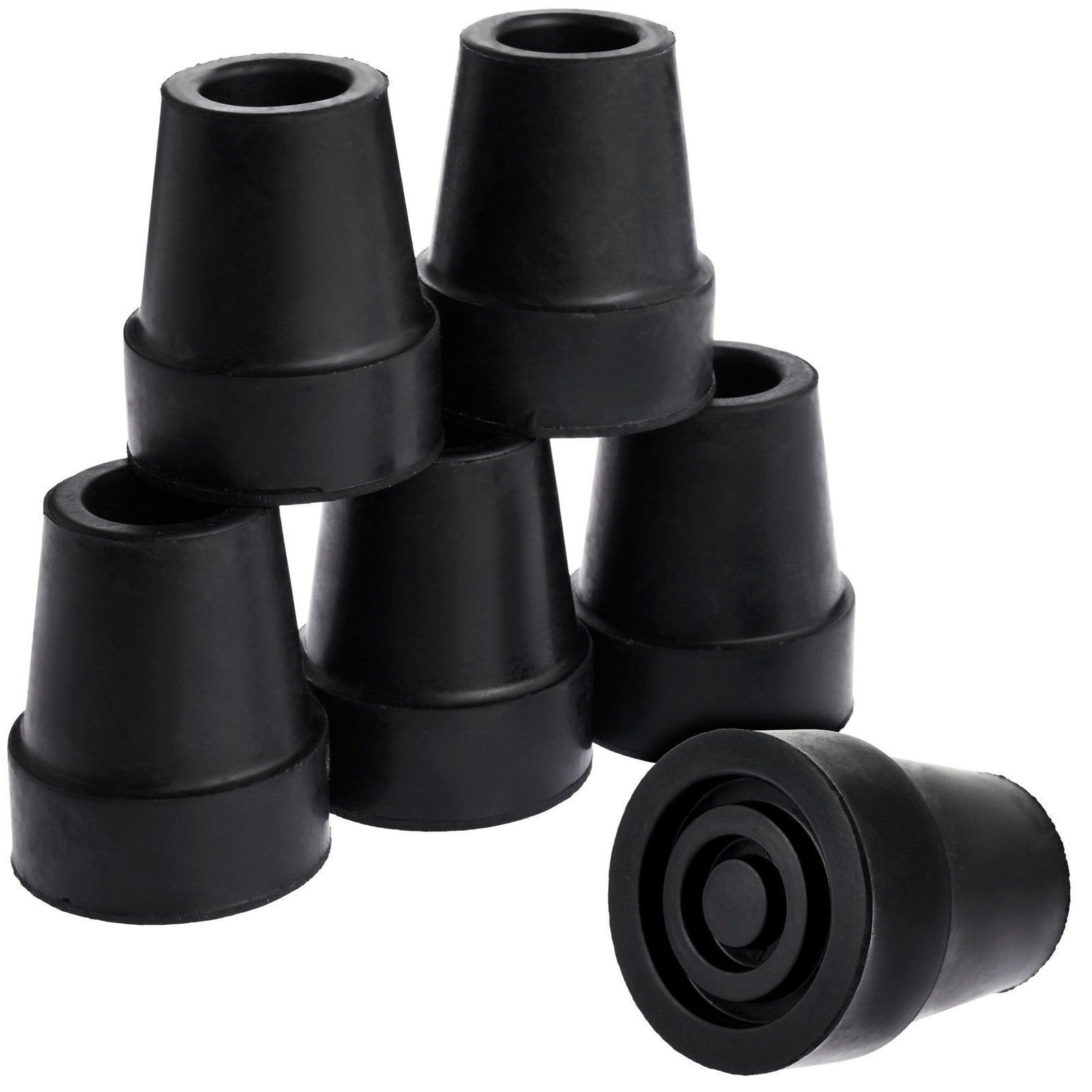 Set of black rubber furniture legs on a white background

