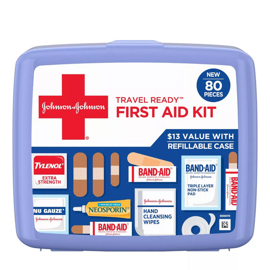 Johnson & Johnson travel first aid kit with various medical items on a white background

