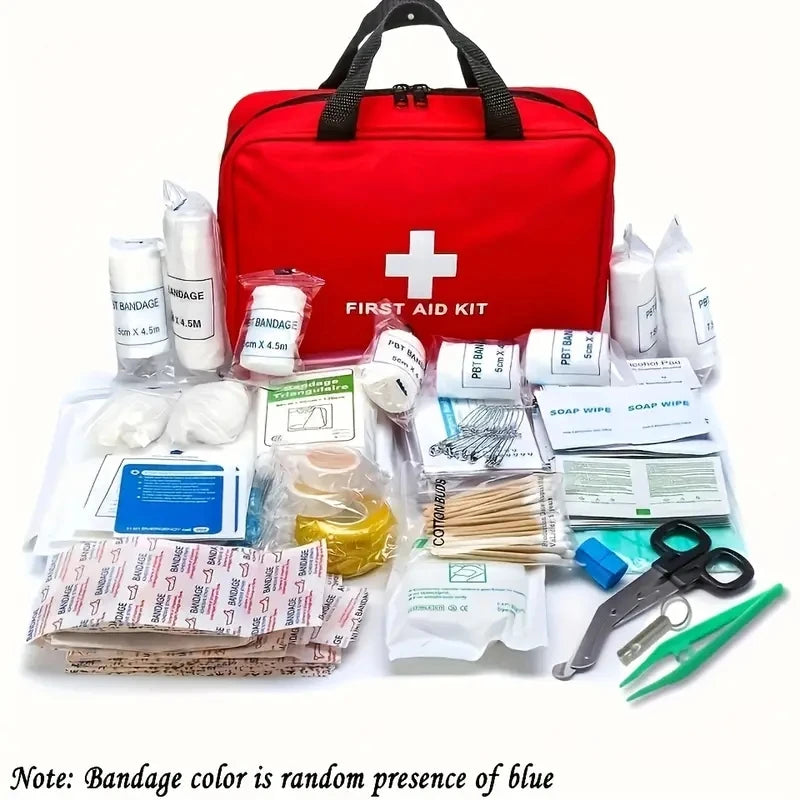 First aid kit with various supplies on a white background

