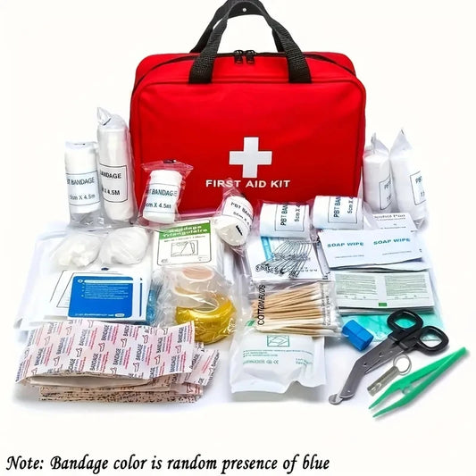 First aid kit with various supplies on a white background

