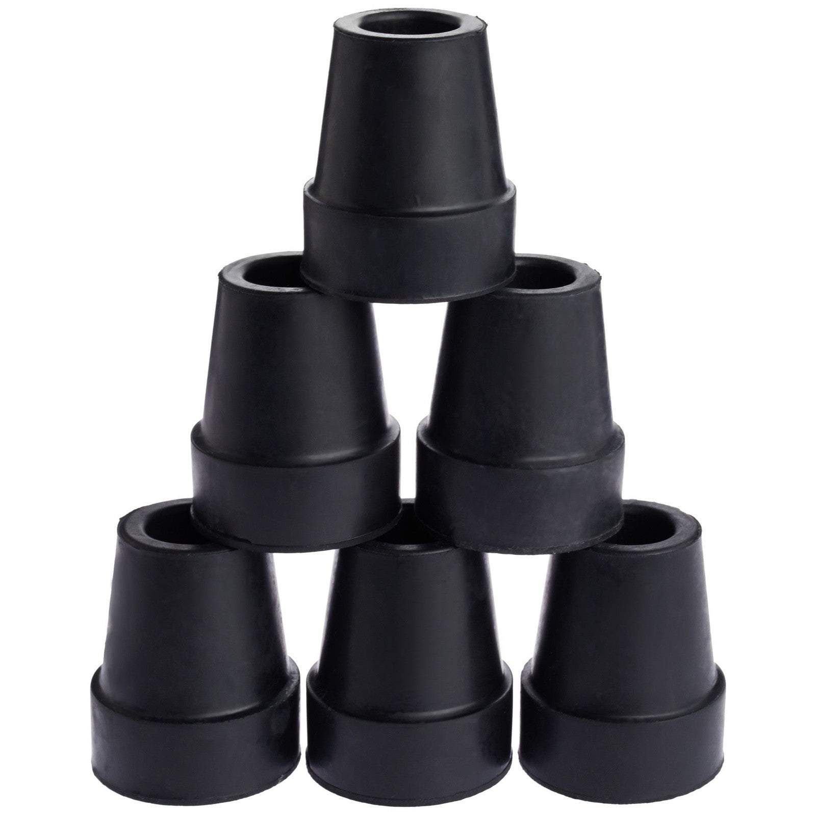 Stack of black rubber furniture feet on a white background

