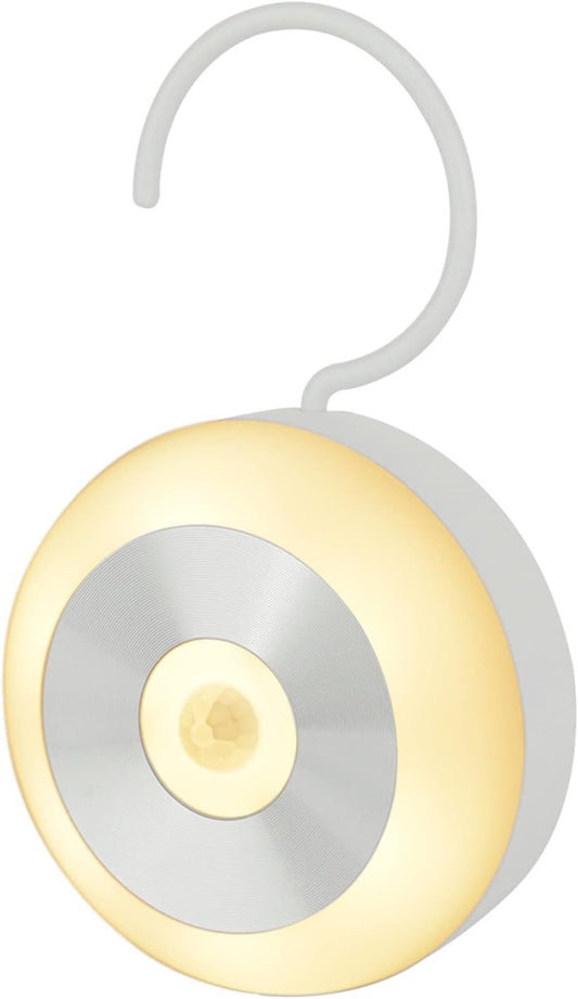 Round LED light with a hook on a white background

