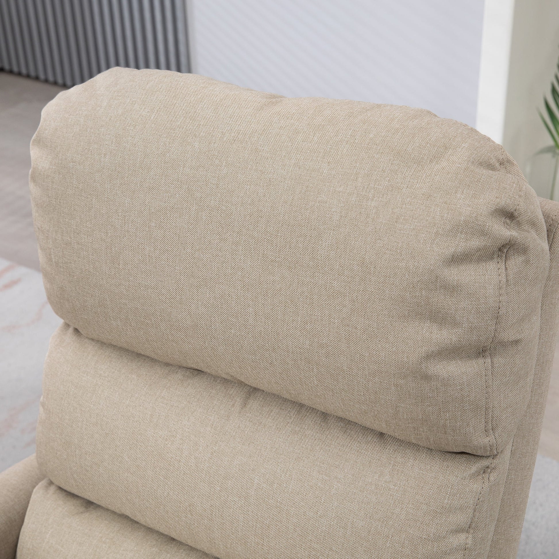 Beige recliner chair with a blurred background