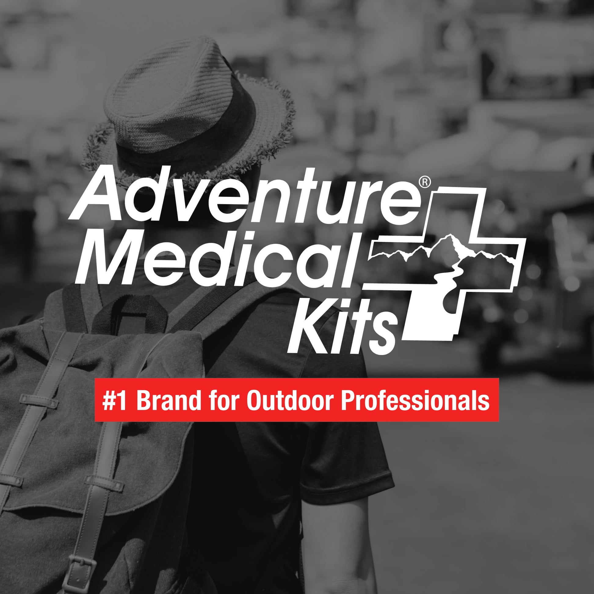 Person wearing a hat and backpack with Adventure Medical Kits logo and text.

