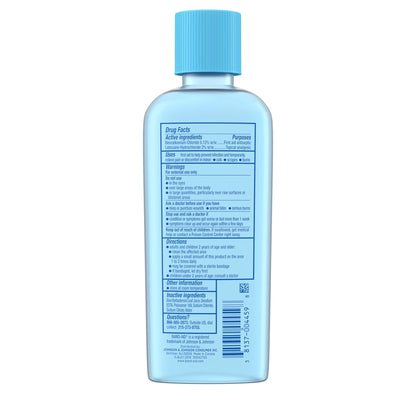 Blue bottle with a label on a white background

