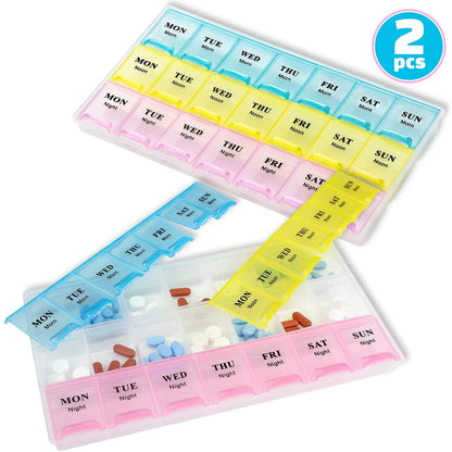 Two pill organizers with colorful compartments for weekdays and weekends, filled with pills.

