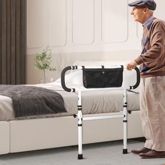 Man using a bed safety rail in a bedroom setting

