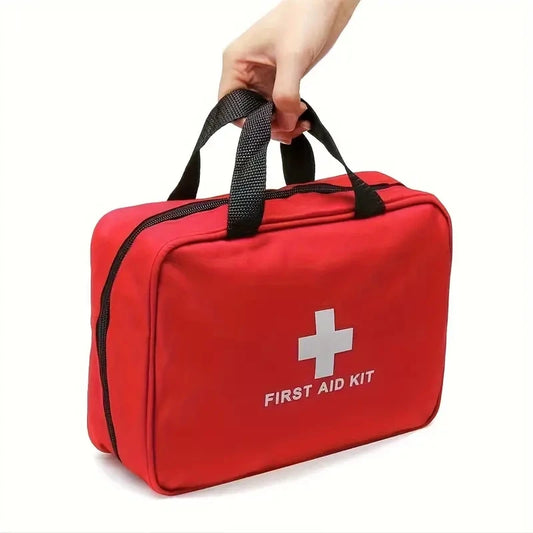 Red first aid kit with a white cross symbol on a white background

