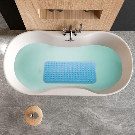 Blue bath pillow in a white bathtub with wooden cabinet and faucet.

