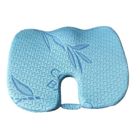 Blue memory foam pillow with woven pattern on a white background


