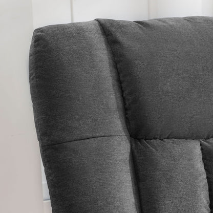 Gray upholstered headboard against a white wall