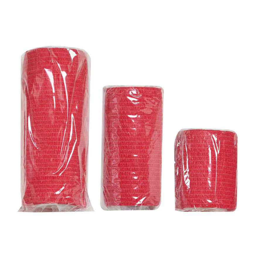 Three rolls of red tape in clear packaging on a white background

