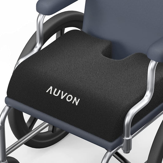 Wheelchair with a black cushion labeled 'AUVON' on a white background

