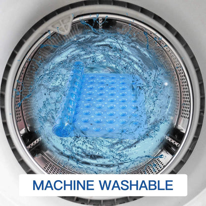 Blue silicone mat in a washing machine with water splashing around it, labeled 'Machine Washable'.

