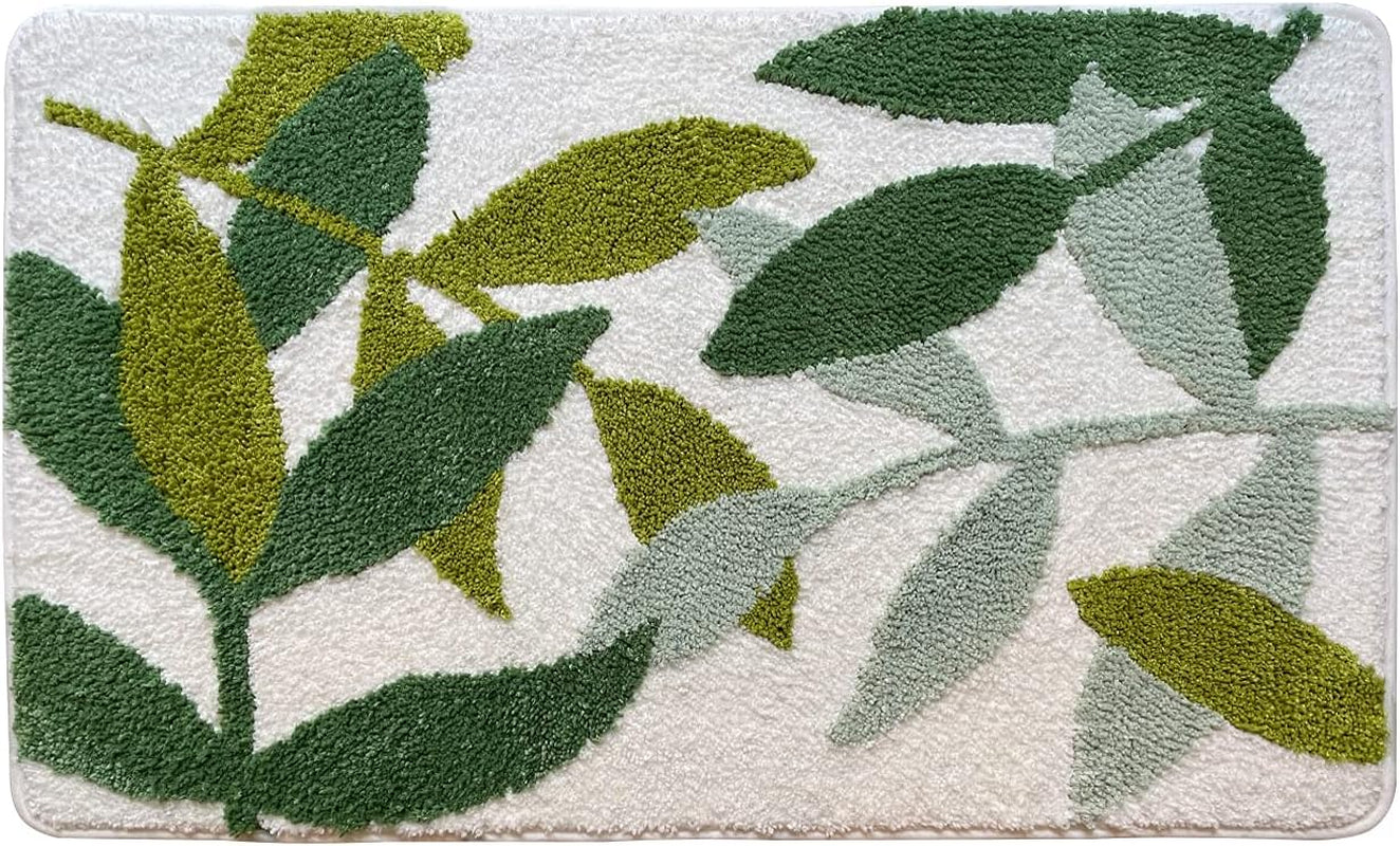 Decorative rug with green leaf pattern on a light background

