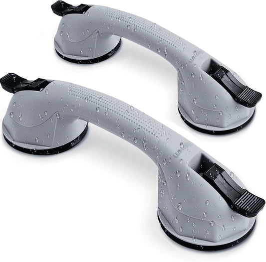 Two gray suction cup handles with black nozzles on a white background