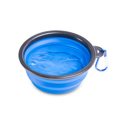 Blue collapsible pet bowl with black rim and carabiner on a white background

