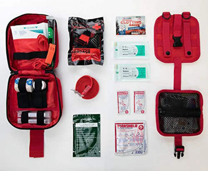 First aid kit with various components on a white background

