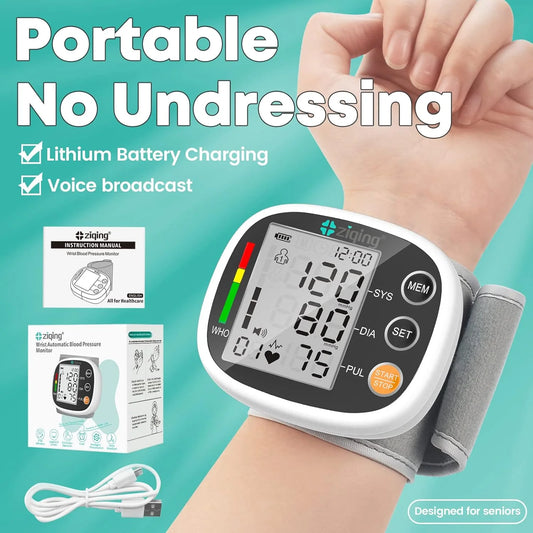Wrist blood pressure monitor with packaging and charging cable on a teal background

