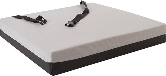 Mattress topper with black straps on a white background

