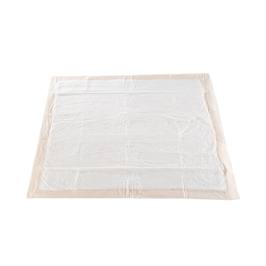 White mattress pad with beige border on a white background