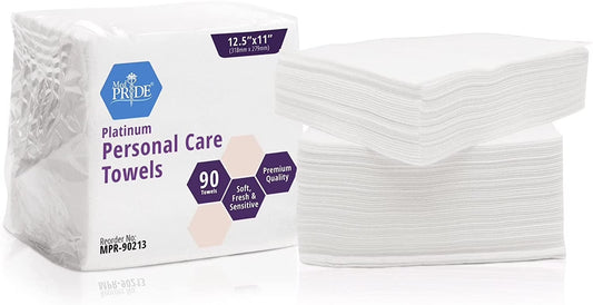Box of Platinum Personal Care Towels with a stack of towels on a white background