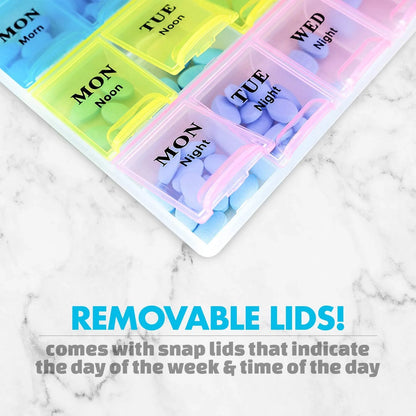 Multicolored pill organizer with snap lids indicating days of the week and times on a marble surface.

