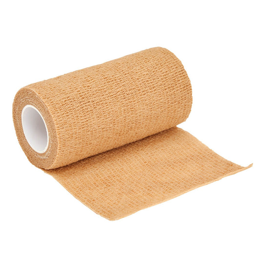 Roll of beige elastic bandage on a white background

