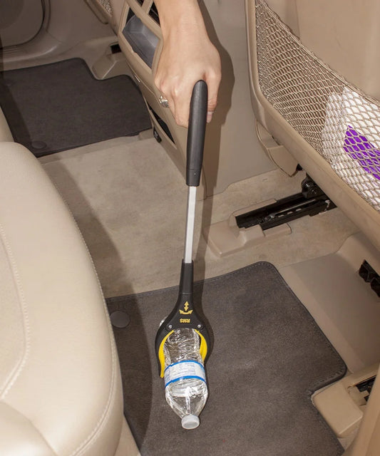 User retrieving items with Royal Medical grabber tool. Ideal for seniors and limited mobility.