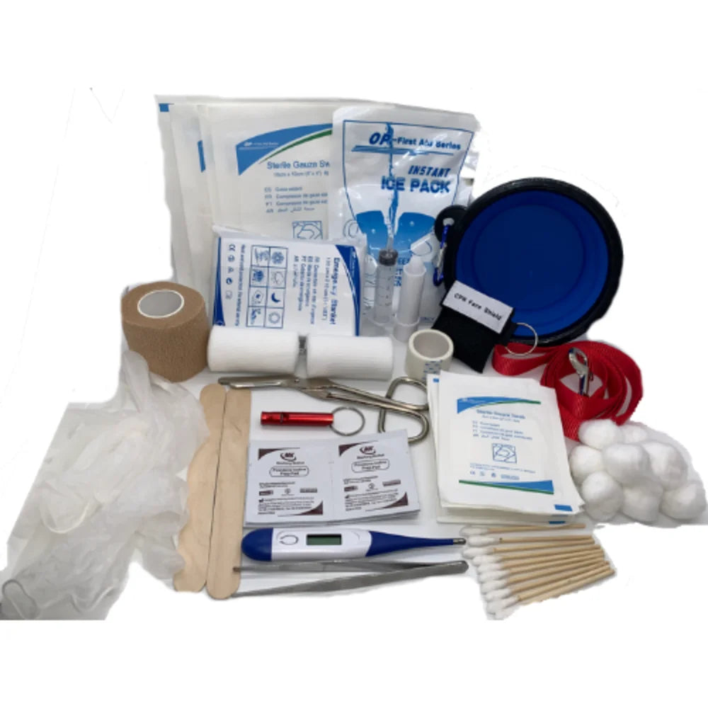 First aid kit with various medical supplies on a white background