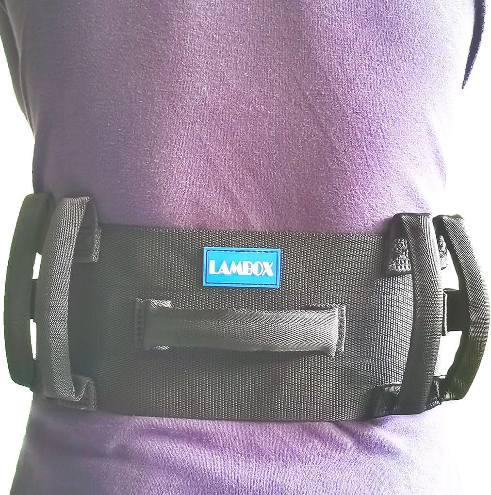 Black waist belt with a blue label on a person wearing a purple shirt.