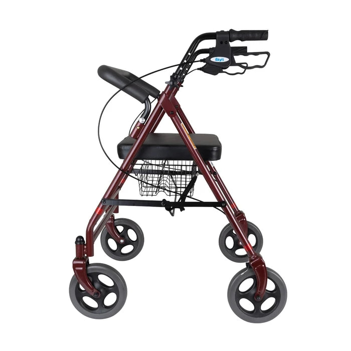 Red rollator with four wheels on a white background