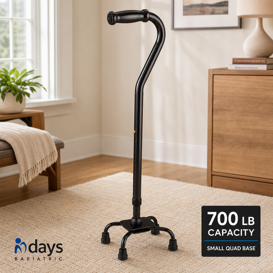 Black cane with 700 lb capacity label in a home setting