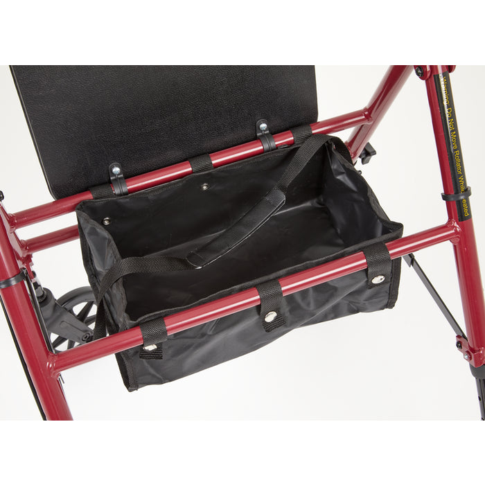 A black fabric storage basket or organizer pouch attached to the red metal frame of a walker, shown against a plain white background.