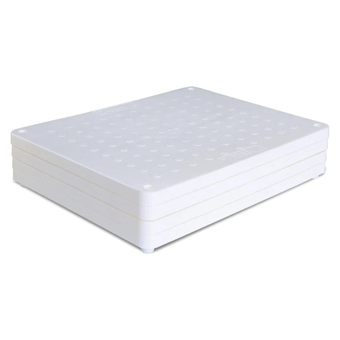 Stack of white bath steps on a white background