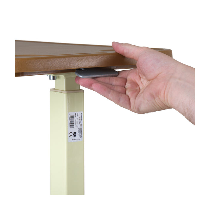 Hand adjusting a height-adjustable desk with a neutral background