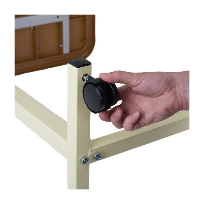 Hand adjusting a caster wheel on a piece of furniture.
