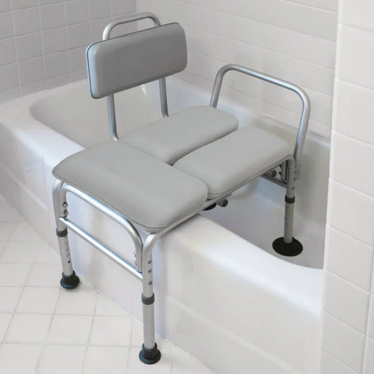 Bath transfer bench with backrest and armrests in a bathroom setting.