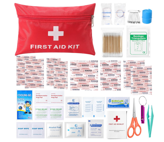 First aid kit with various components on a white background

