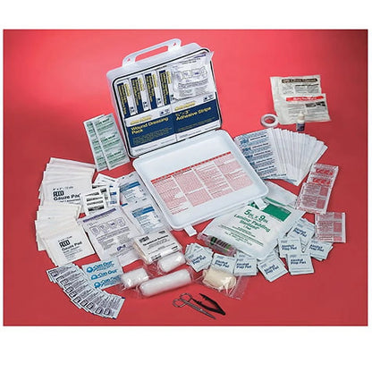 First aid kit with various supplies on a red background

