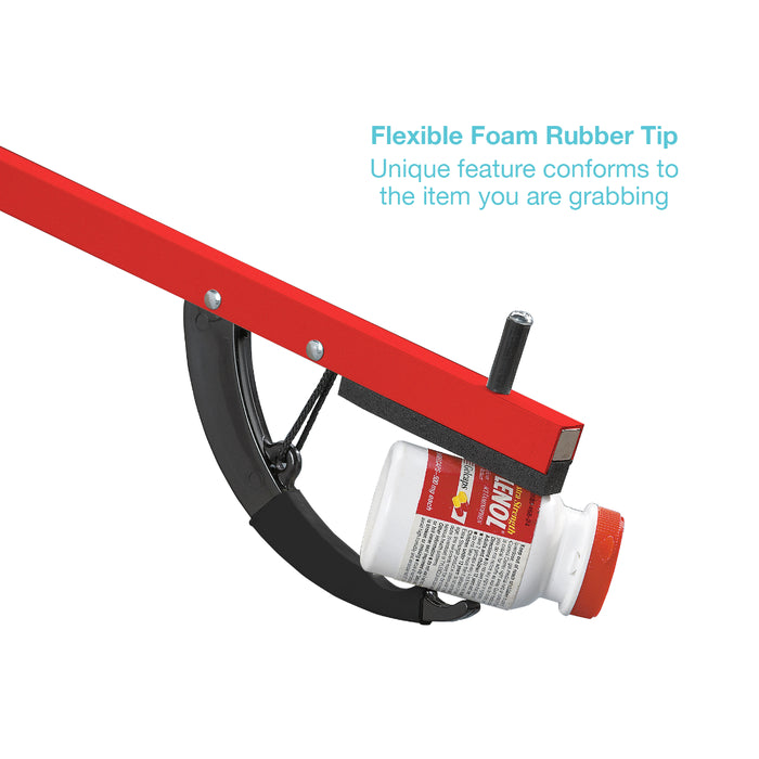 A red and black foam gripper holding a white medicine bottle, with blue text on a white background explaining the flexible foam rubber tip feature.
