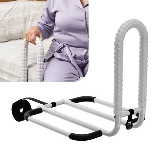 Bed rail with a person sitting on a bed in the background