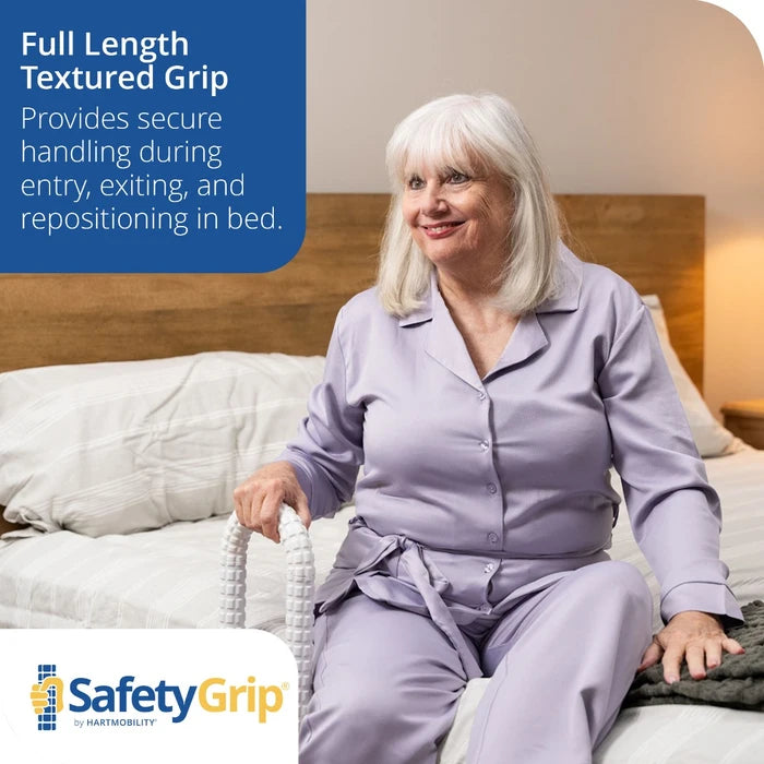 Woman in purple pajamas sitting on a bed with a SafetyGrip product, text about secure handling.